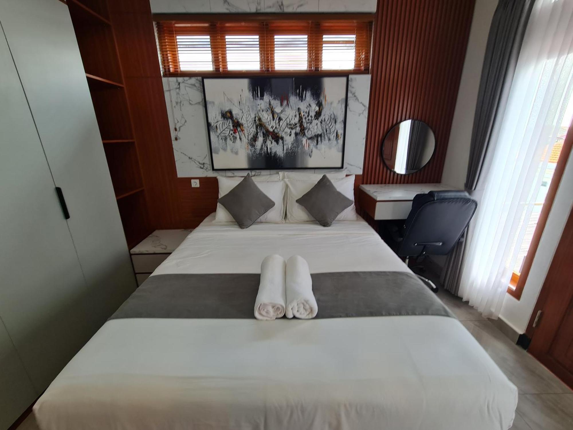 Отель Shin In Bali Кута Экстерьер фото